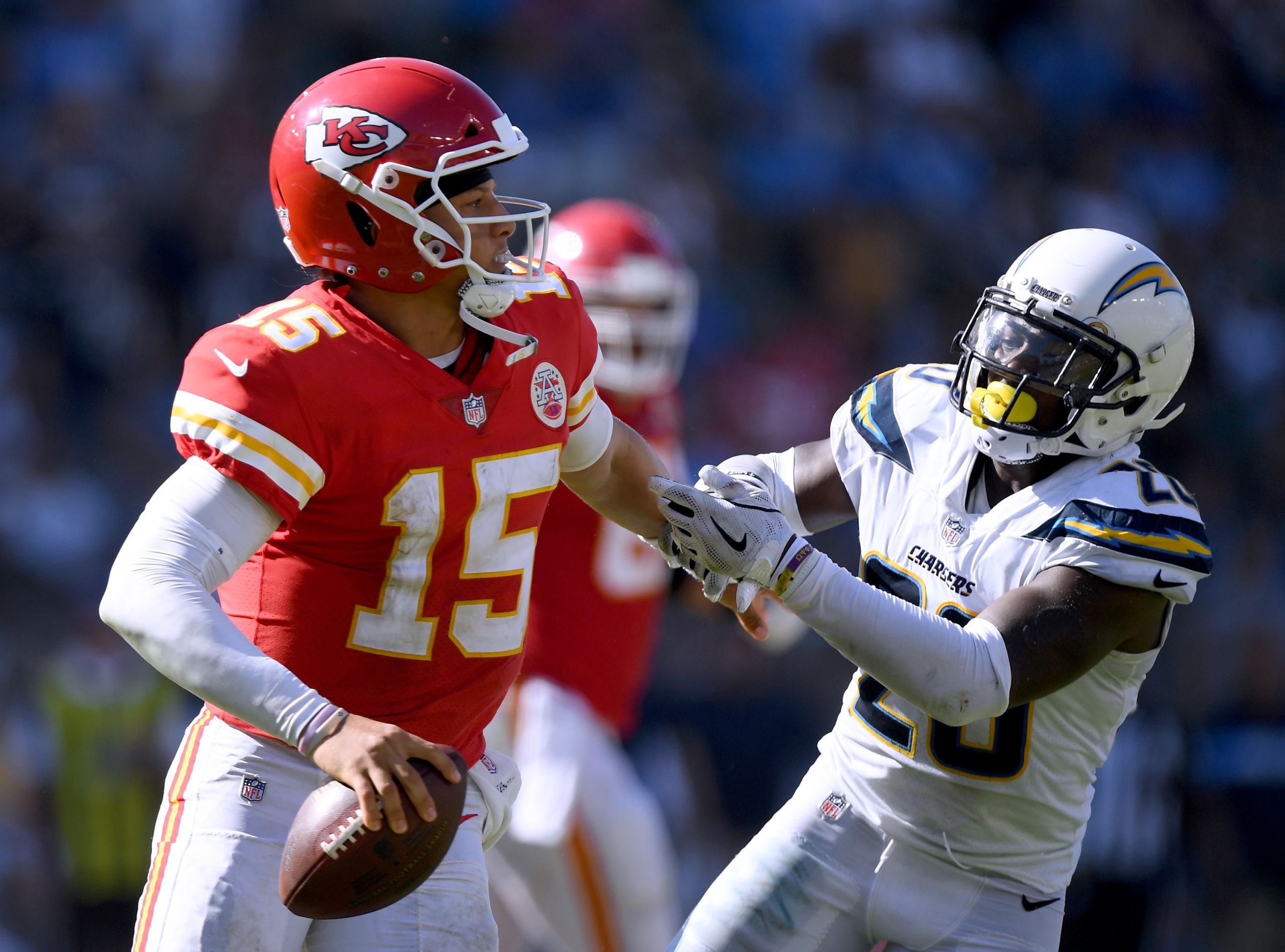 Kansas City Chiefs quarterback Patrick Mahomes smiles on the sidelines  before the first half of an NFL football game against the Green Bay Packers  in Kansas City, Mo., Sunday, Oct. 27, 2019. (